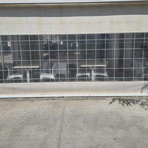 TOLDO CORTINA ENROLLABLE CERRAMIENTO VERTICAL TRANSPARENTE
